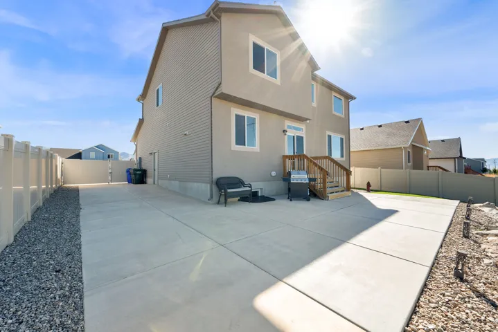 Two-story exterior with stucco and siding finishes