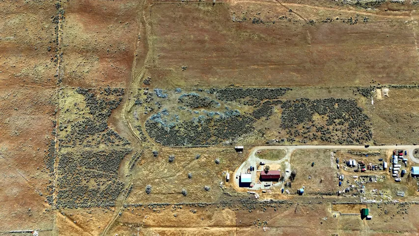 Extensive undeveloped acreage featuring natural terrain and sparse vegetation