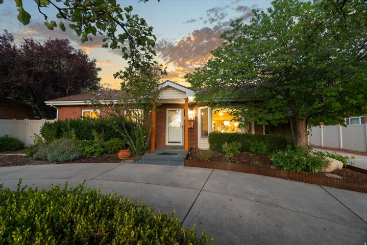 Brick exterior with an inviting covered entry