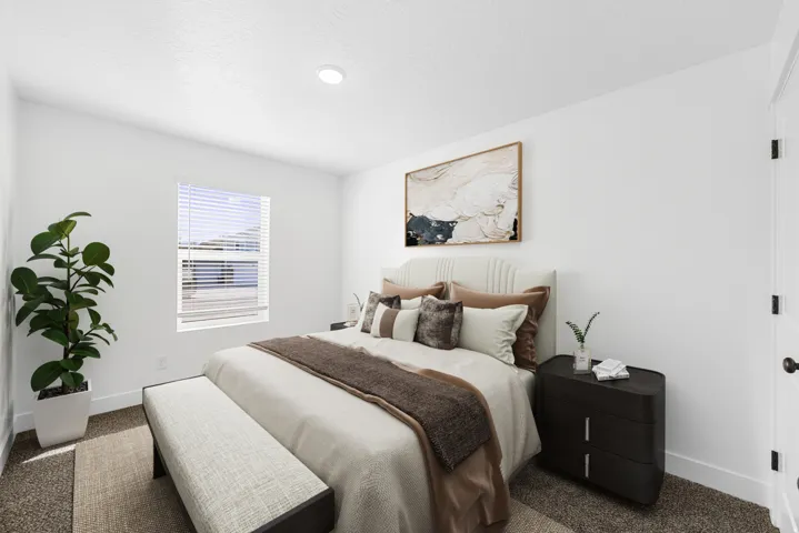 Recessed ceiling lighting, white walls, window with blinds, and dark carpet