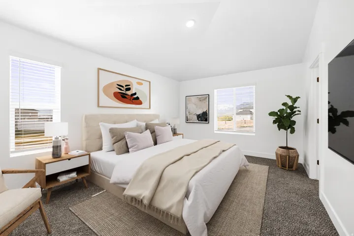 Recessed lighting, dual windows with blinds, plush carpet flooring, and a white interior door
