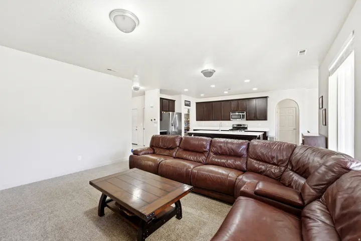 Recessed lighting and ceiling-mounted fixtures illuminate the space
