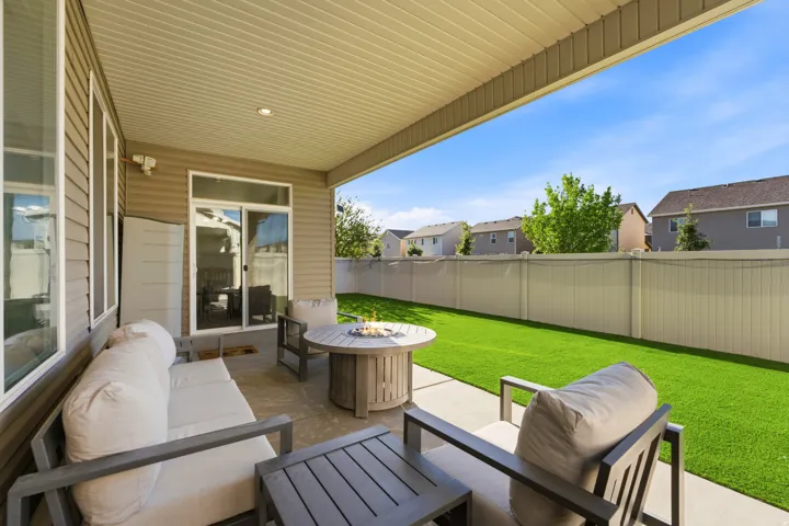 Covered patio with concrete flooring, recessed lighting, and sliding glass door access