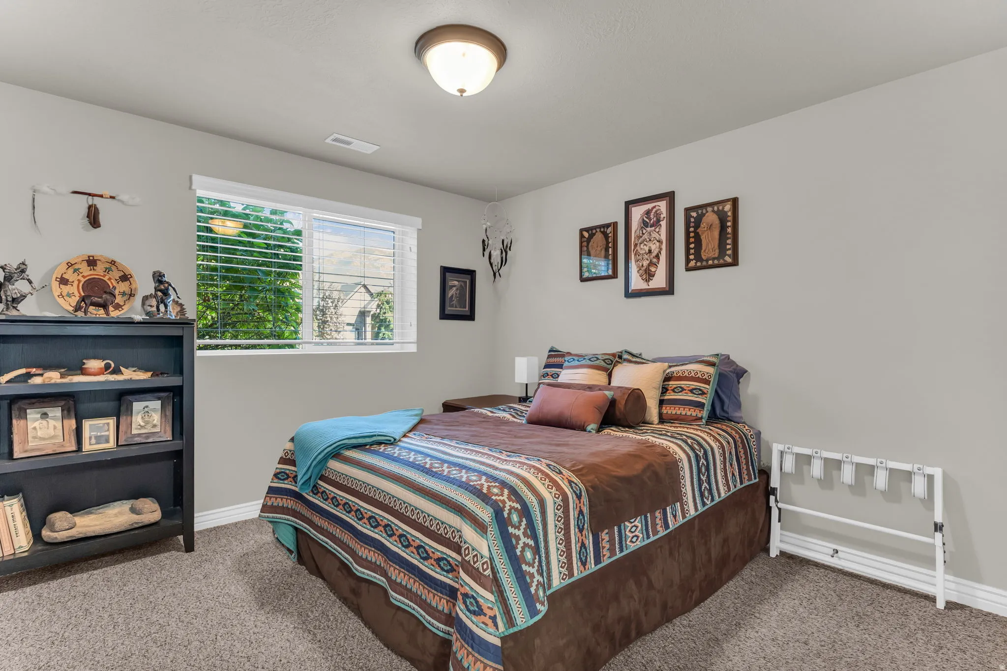 Recessed window with horizontal blinds, overhead flush mount lighting, and neutral wall paint