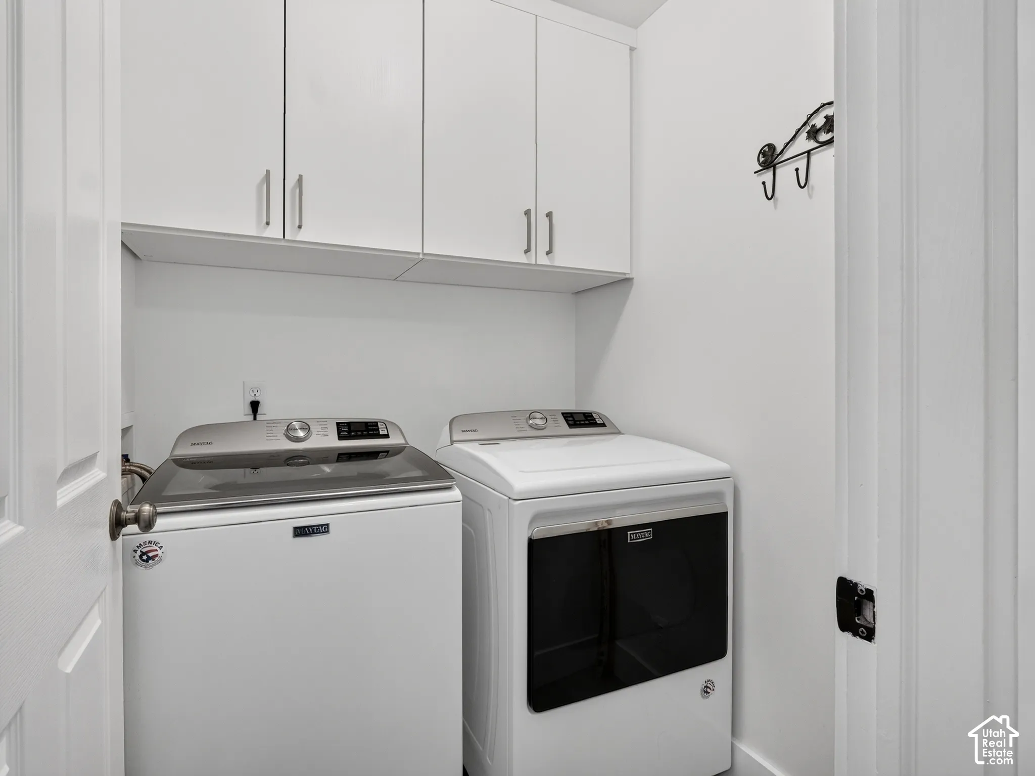 White cabinetry with silver hardware