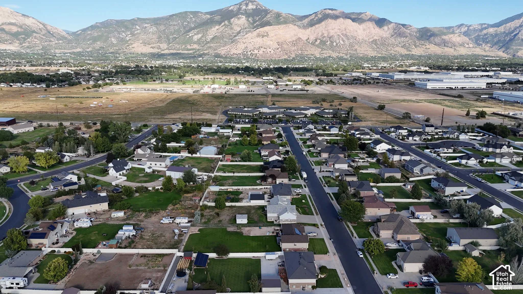 Residential neighborhood with established streets and a mountainous backdrop