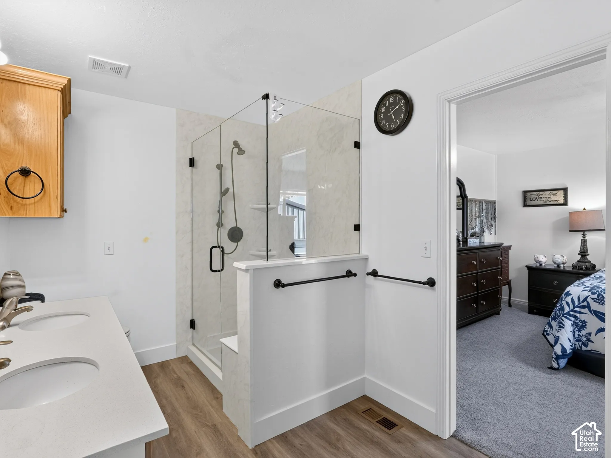 Dual vanity with integrated sinks and brushed nickel faucets