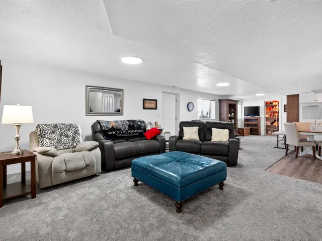 Recessed lighting and a textured ceiling