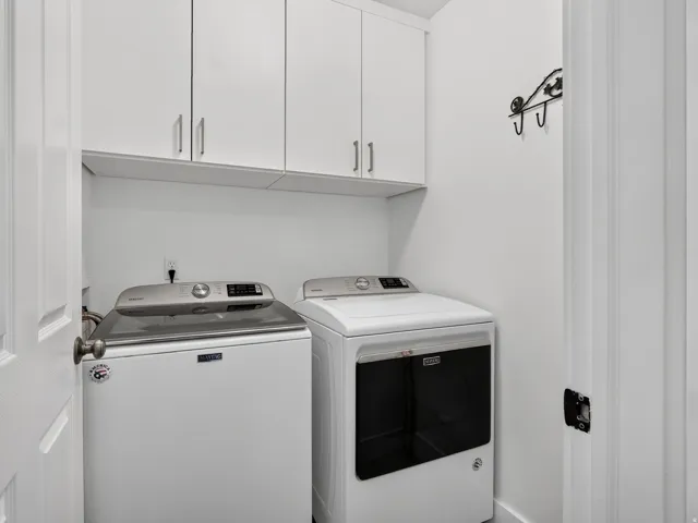 White cabinetry with silver hardware