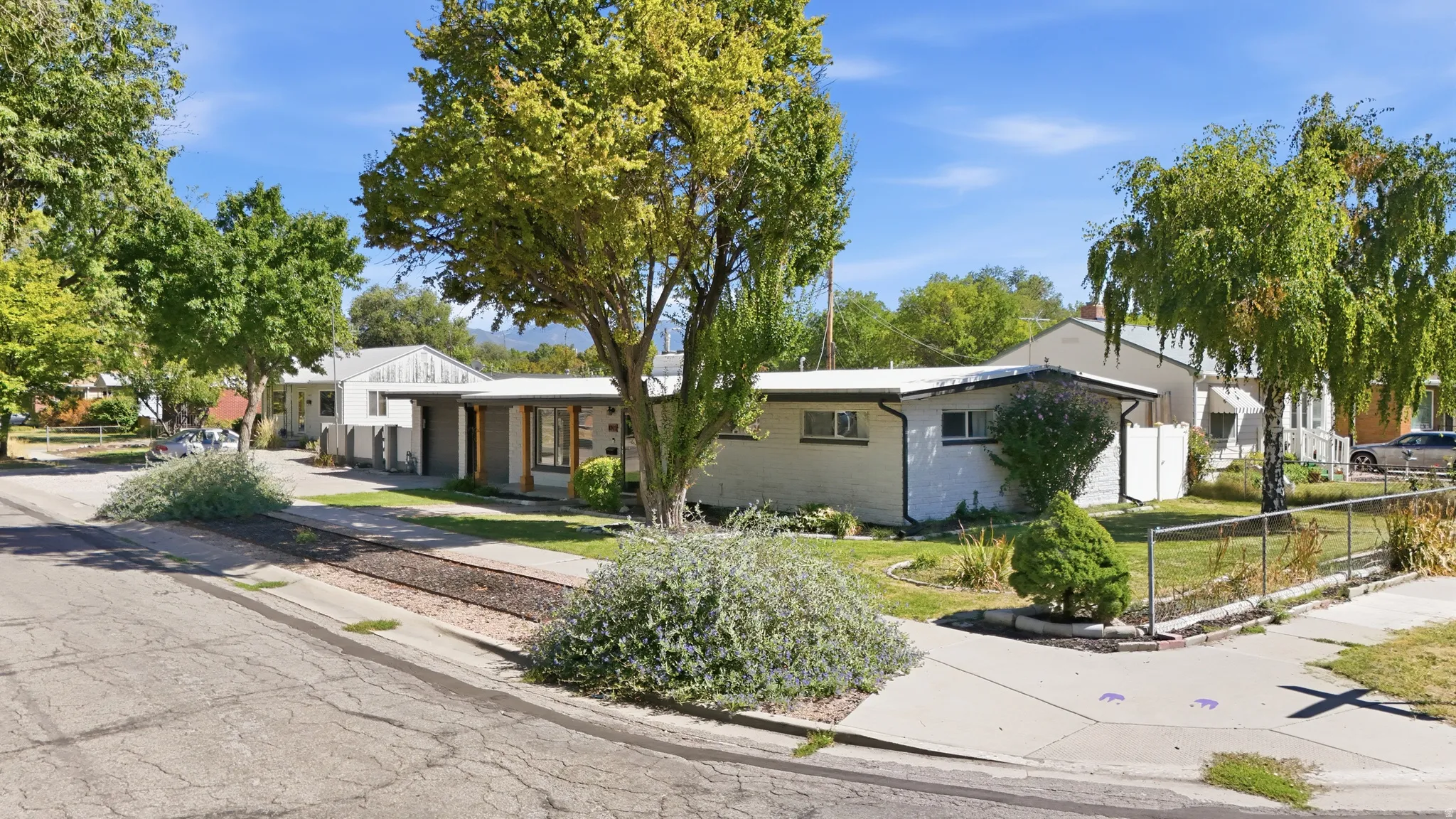 White exterior with a flat roofline