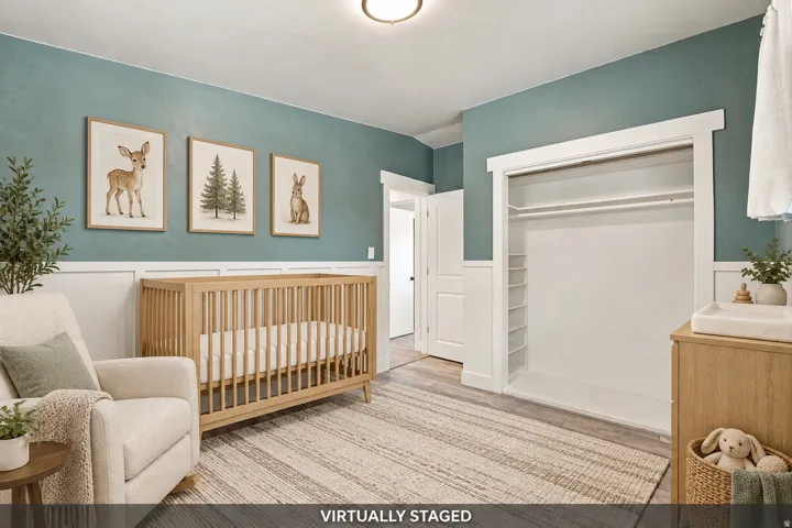 Two-tone painted walls with wainscoting and crown molding