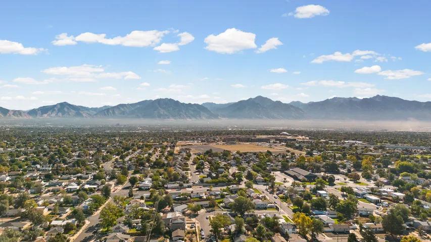 Expansive neighborhood setting with established residential properties and mature landscaping