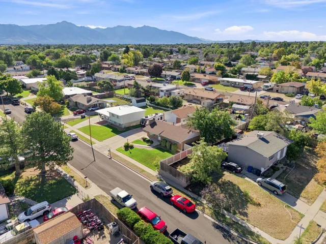 Expansive neighborhood featuring mature trees and established residential properties
