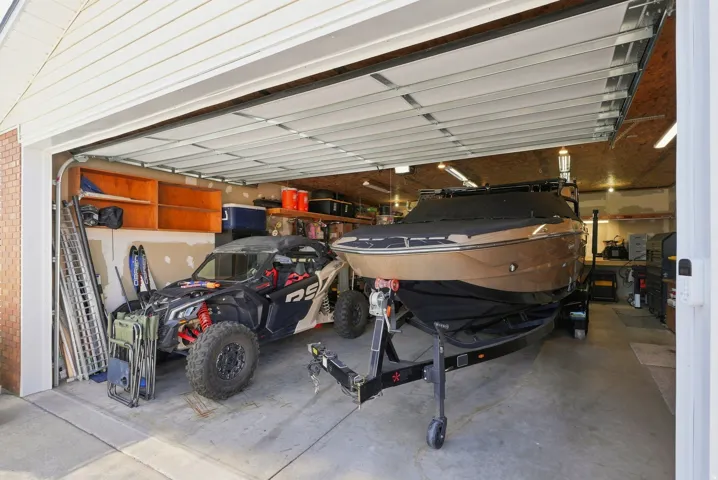 Detached garage, 18x9 door, and heating and cooling!
