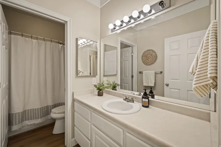 Vanity with integrated sink, extensive counter space, and cabinet storage