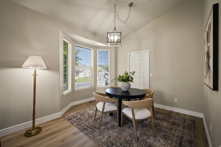 Bay window with multiple panes and horizontal blinds
