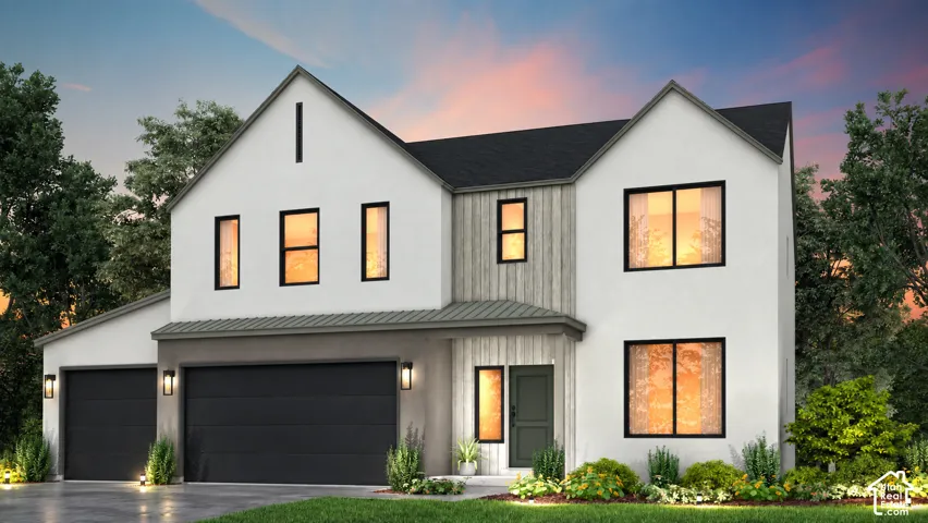 Modern exterior with a light-colored stucco finish and dark trim accents