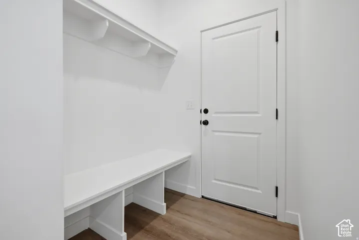 Built-in bench with cubby storage and shelving
