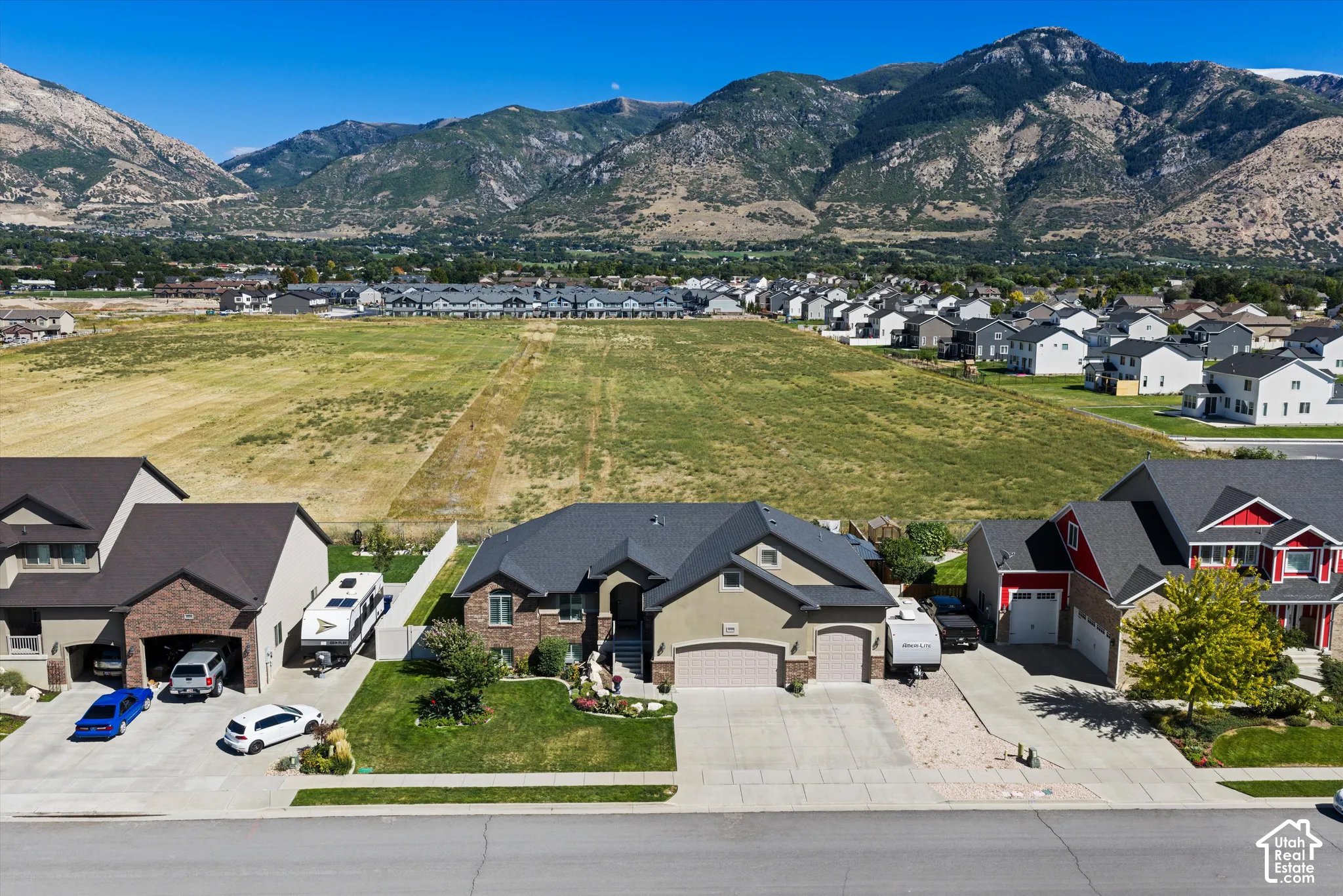 Mountainous backdrop with expansive open fields