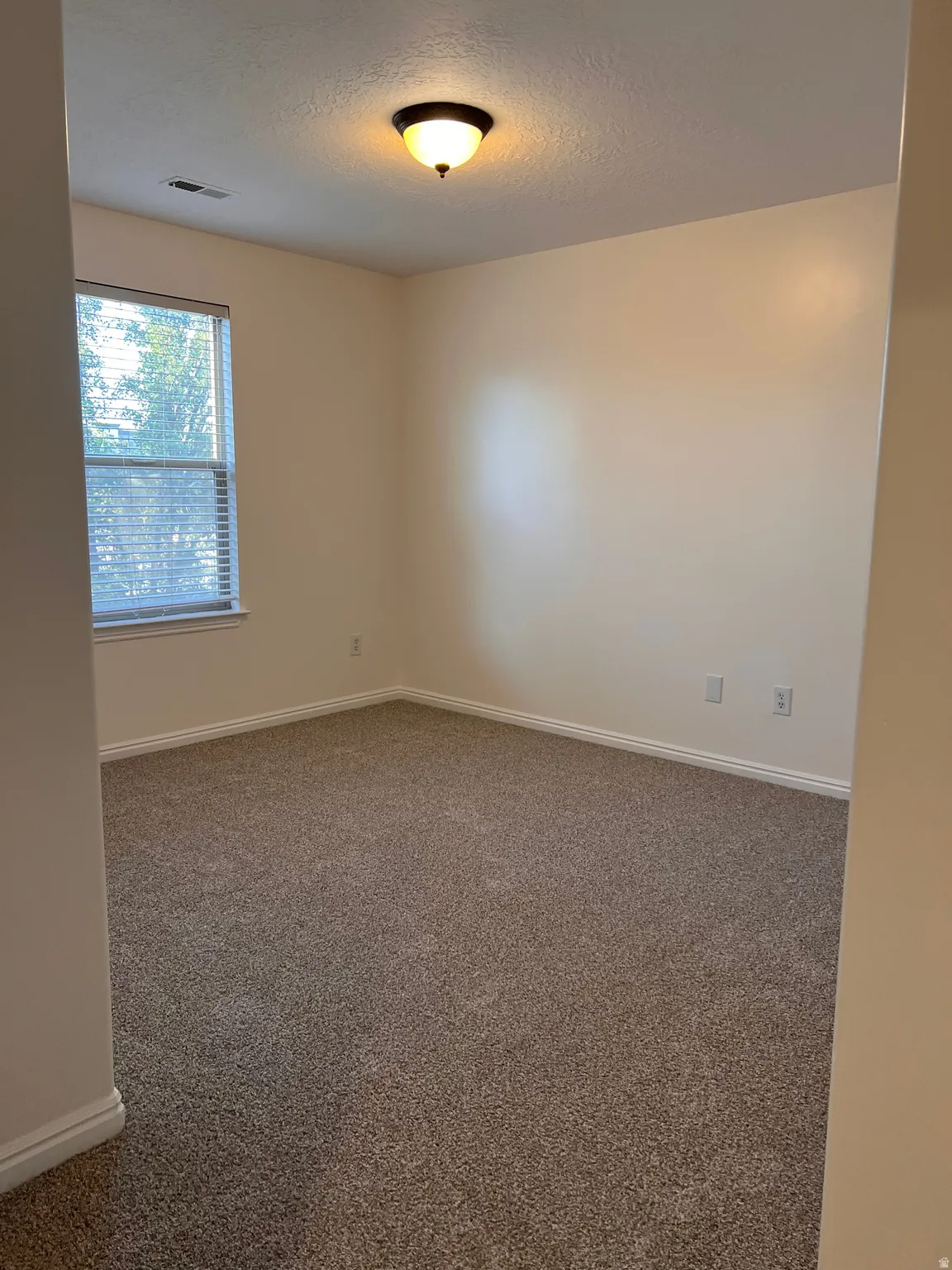 Second level two  bedroom, new carpet, new paint