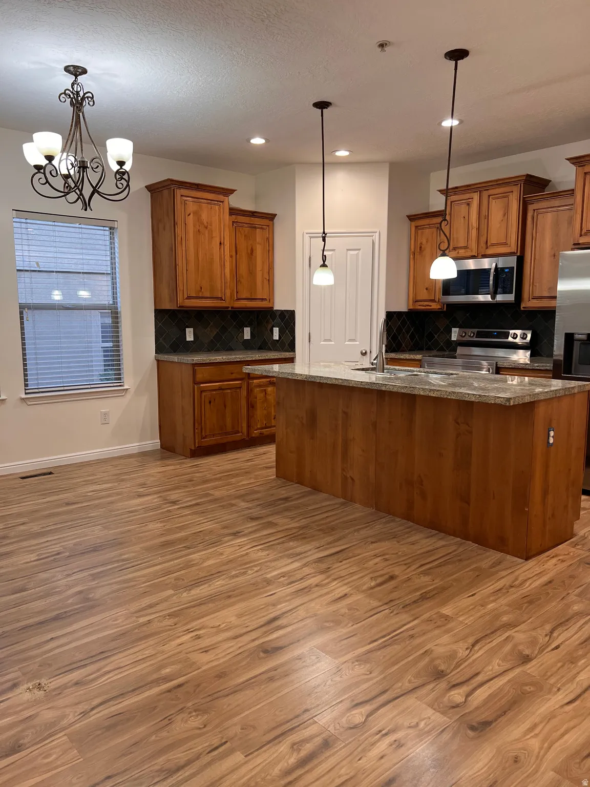 Kitchen and dining area, new flooring, new paint