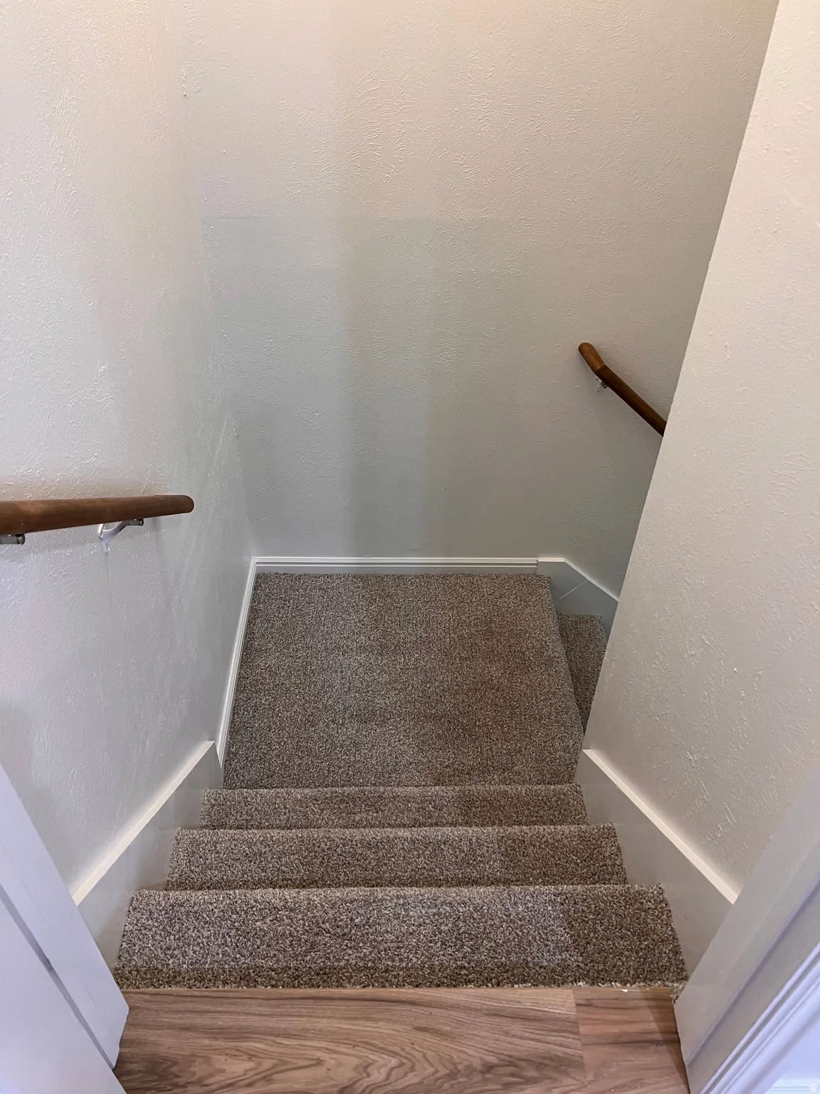 Stairs to basement, new carpet, new paint