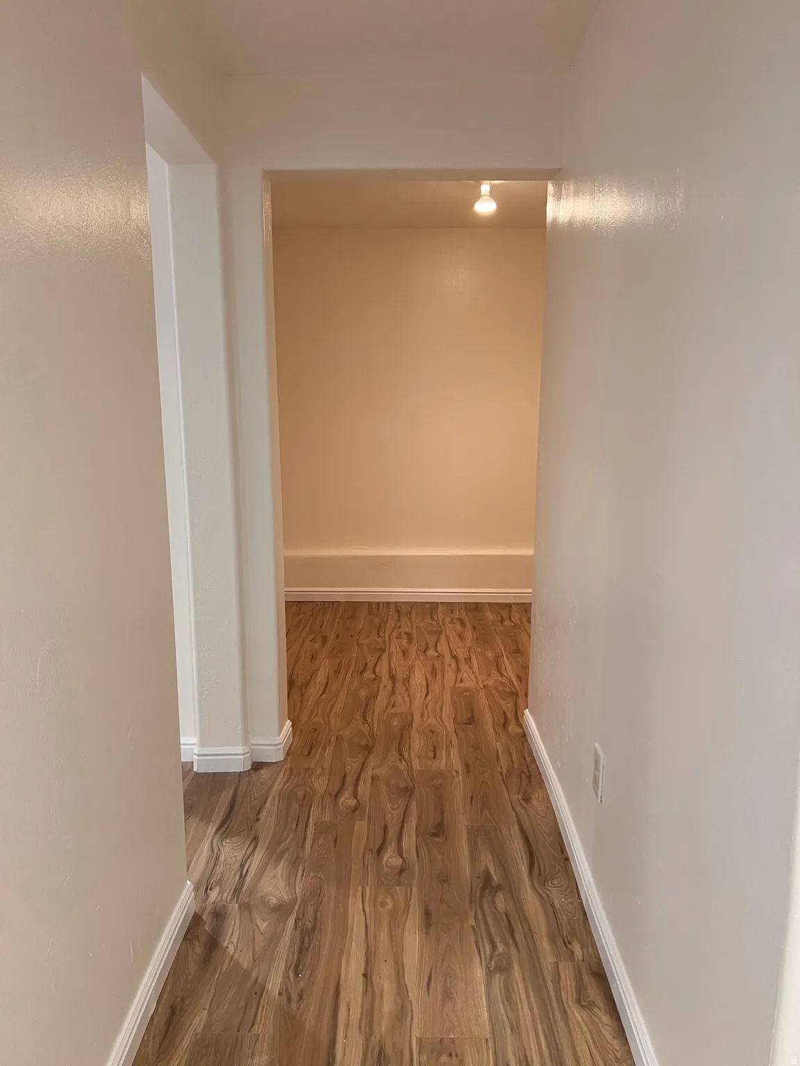 Basement hallway, new flooring, new paint