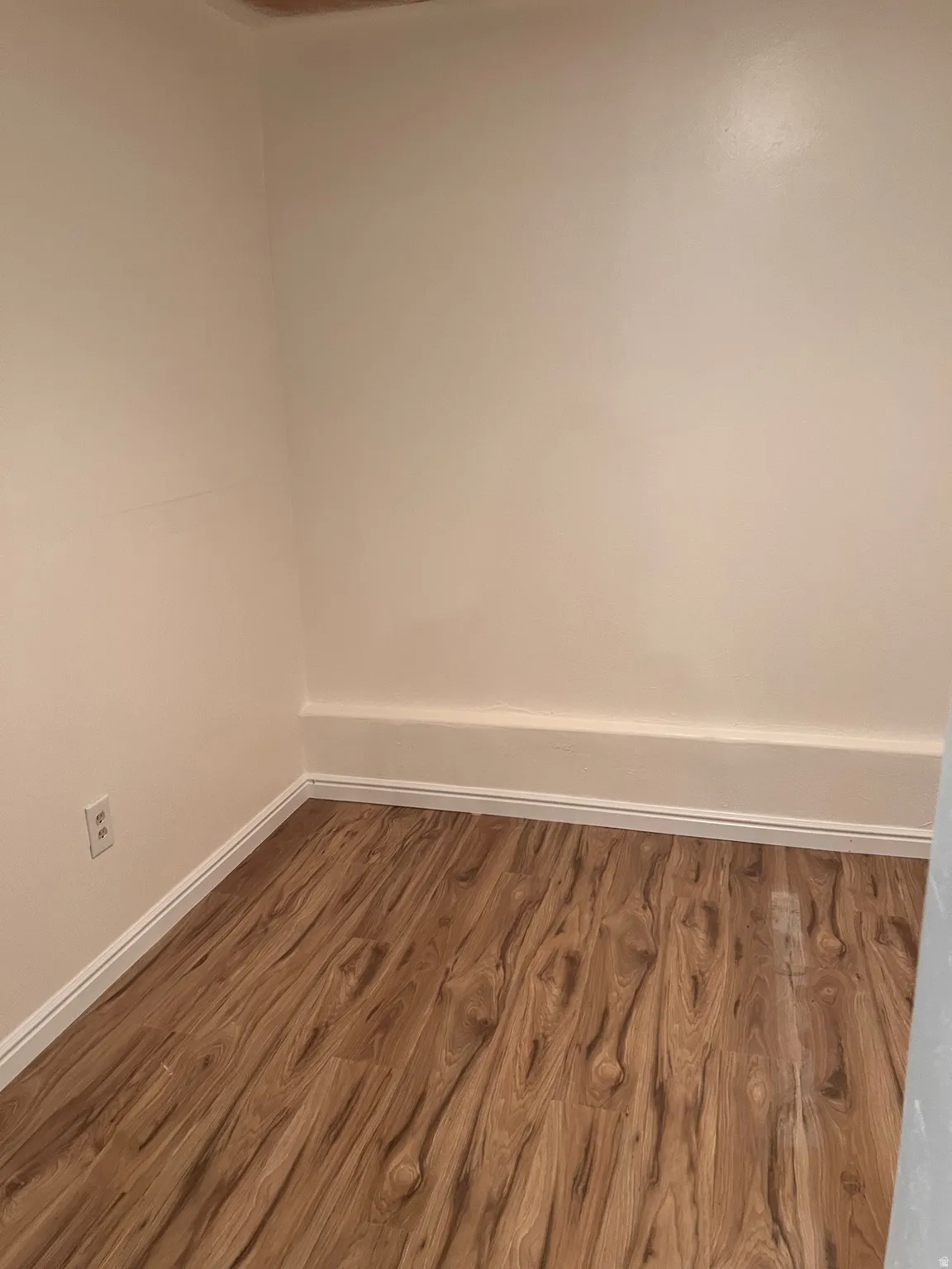 Additional basement room - great for office or craft room, new flooring, new paint