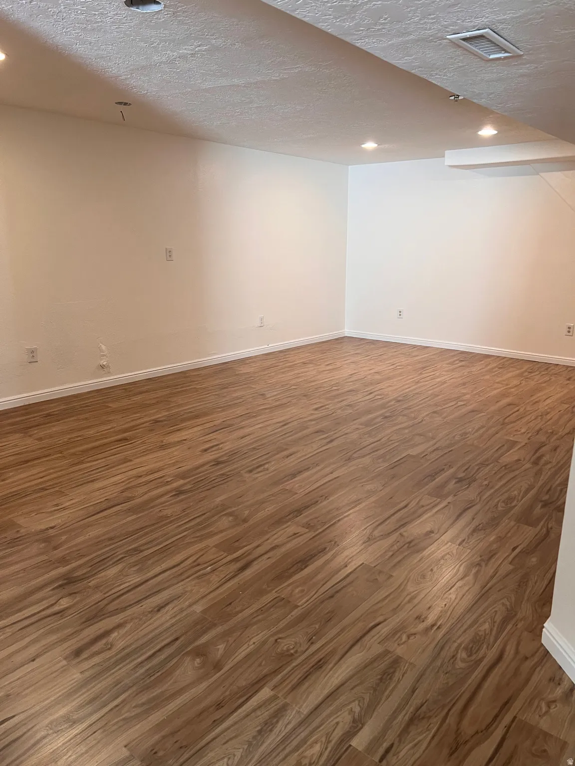 Spacious family room, new flooring, new paint