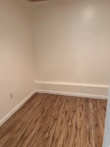 Additional basement room - great for office or craft room, new flooring, new paint