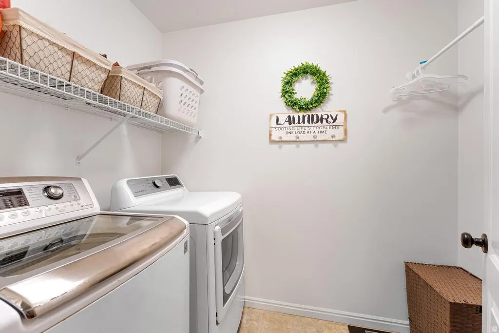 White wire shelving unit, built-in clothing rod, and neutral wall paint