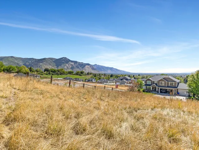 Expansive land offering mountain and distant valley scenery