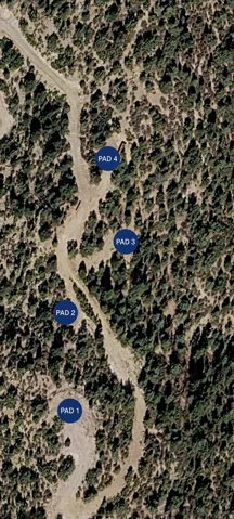 Satellite Imagery. Illustrating the spatial relationship of four designated pads on the property