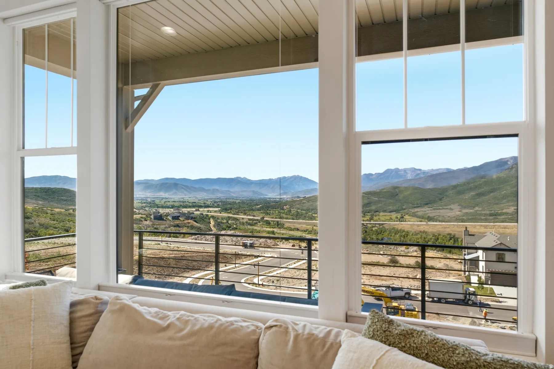 Expansive windows offering mountain scenery