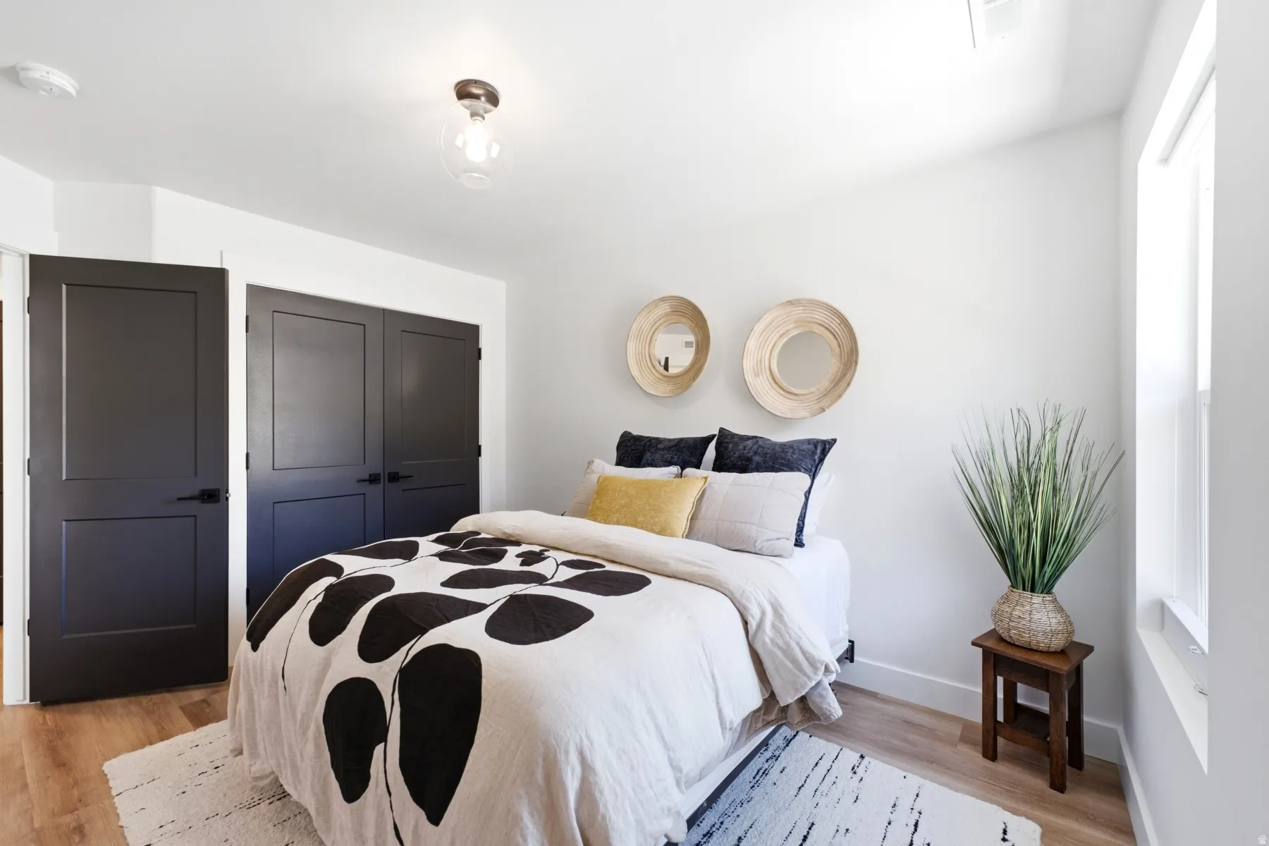White walls with wood-finish flooring