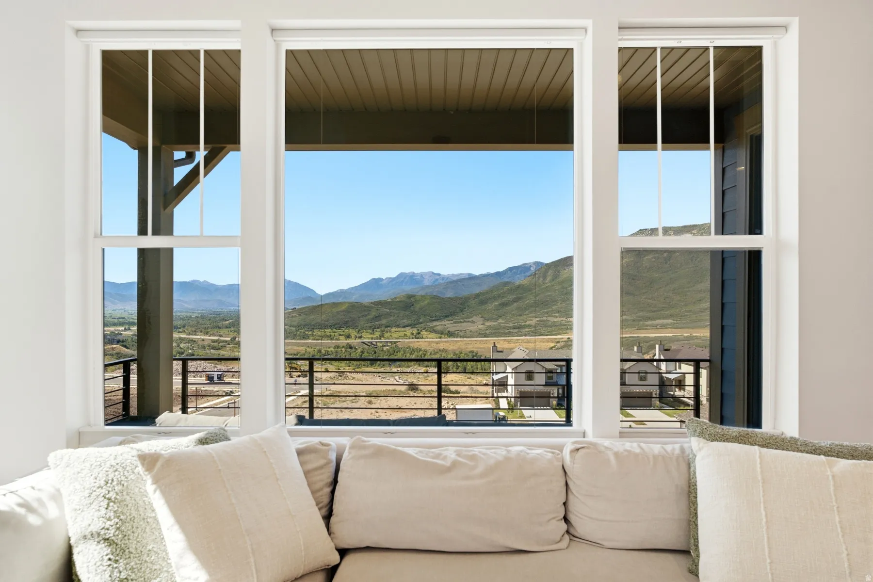 Triple window arrangement, offering expansive mountain scenery