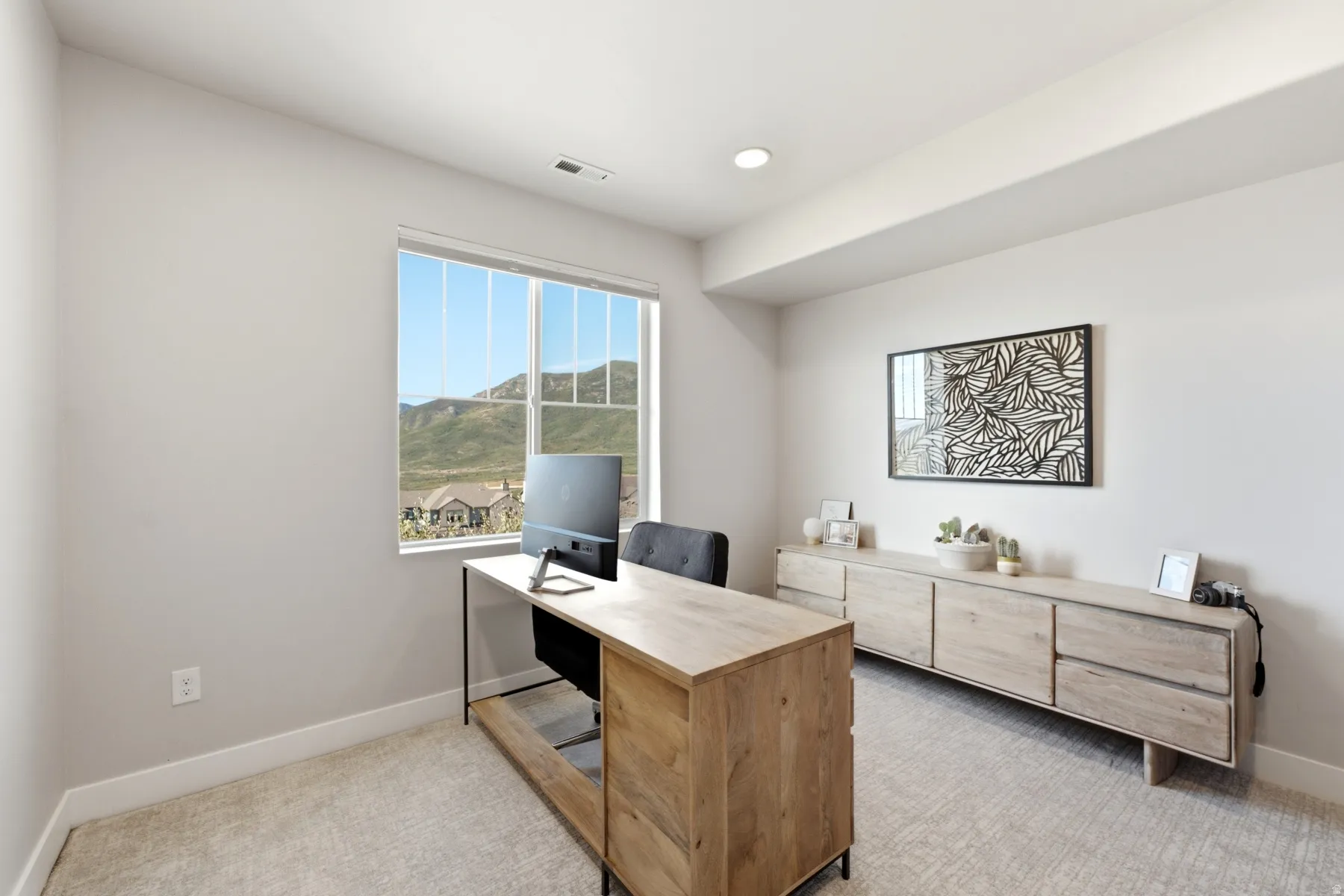 Large window with mountain backdrop