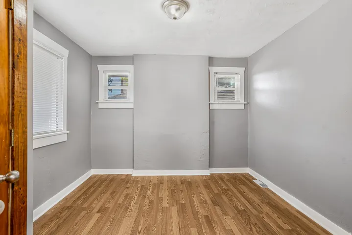 Wood-finish flooring with white trim