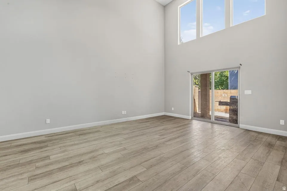 Vaulted ceilings with high transom windows