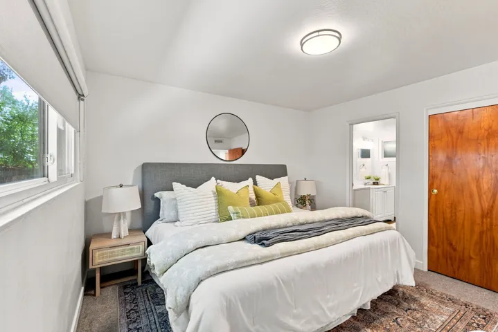 White walls with a flush-mount ceiling light fixture