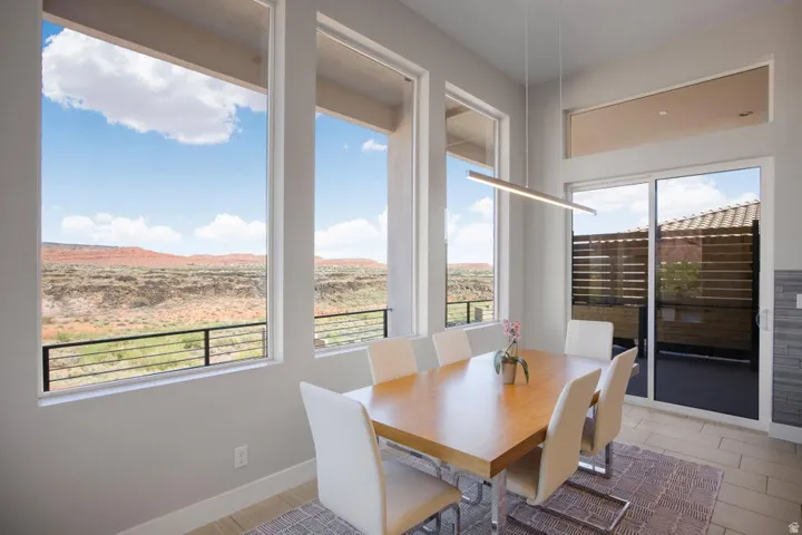 Expansive windows showcasing a desert landscape