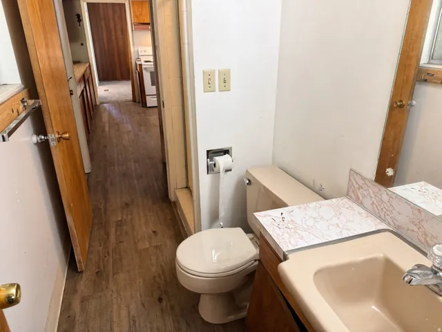 Wood-finish flooring throughout