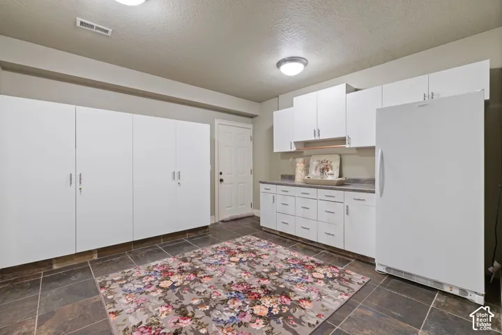 Storage lower level with walkout to garage