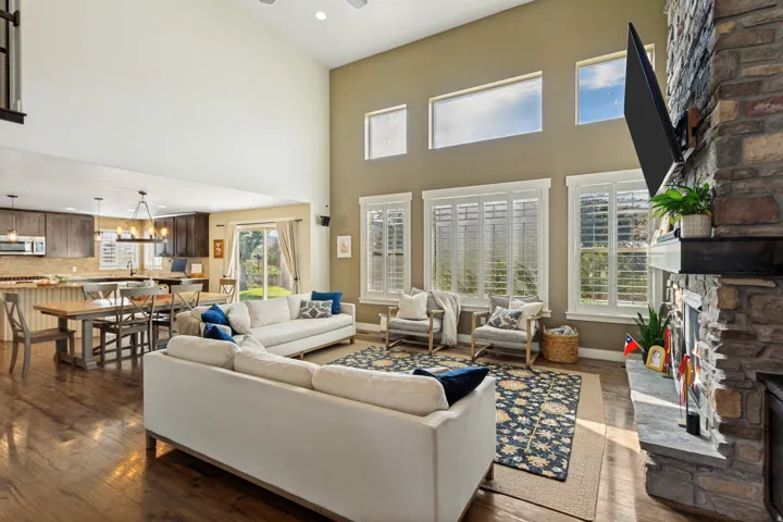 Two-story living area with wood-finish flooring