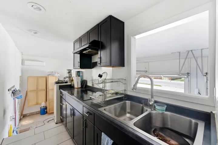 Kitchenette added to entry from garagae