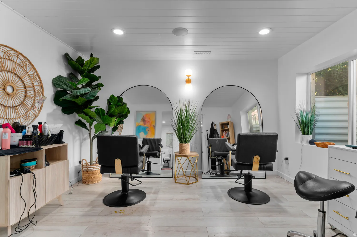 White shiplap ceiling with recessed lighting, light wood-finish flooring, and white walls