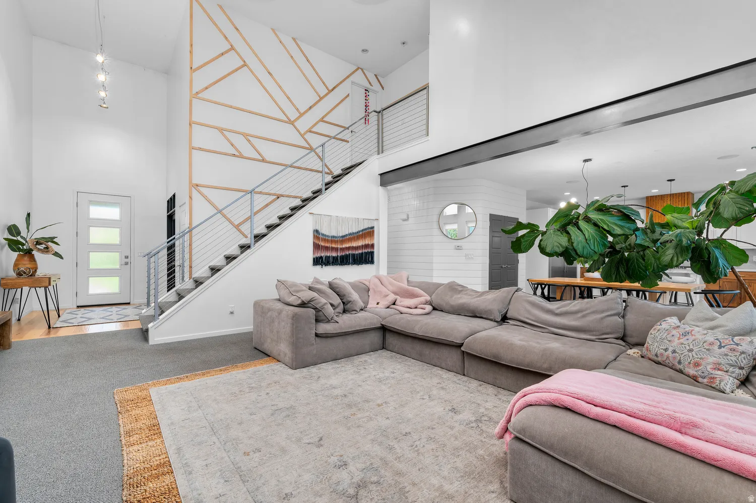 Soaring ceilings with a decorative wood accent wall