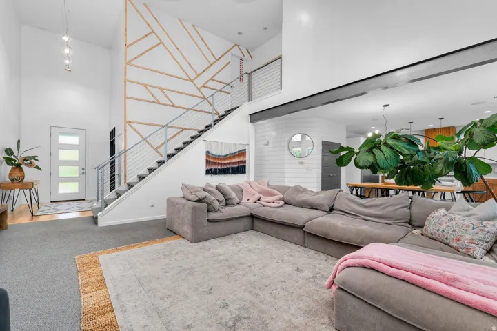 Soaring ceilings with a decorative wood accent wall