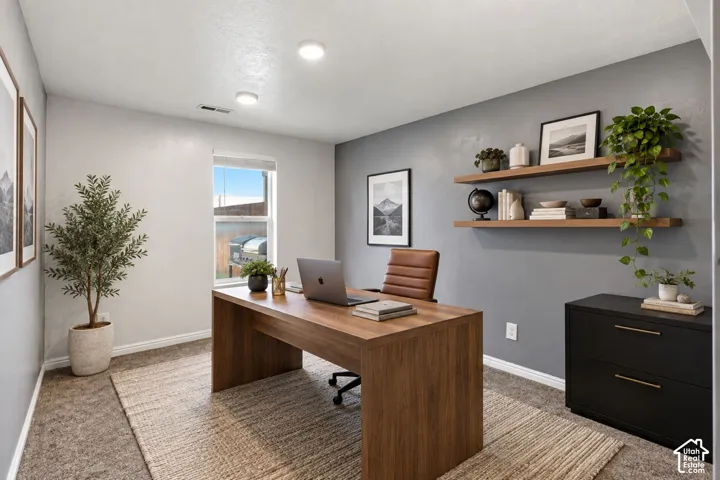 Recessed ceiling lighting, a window with blinds, and built-in floating wood shelves on a contrasting accent wall