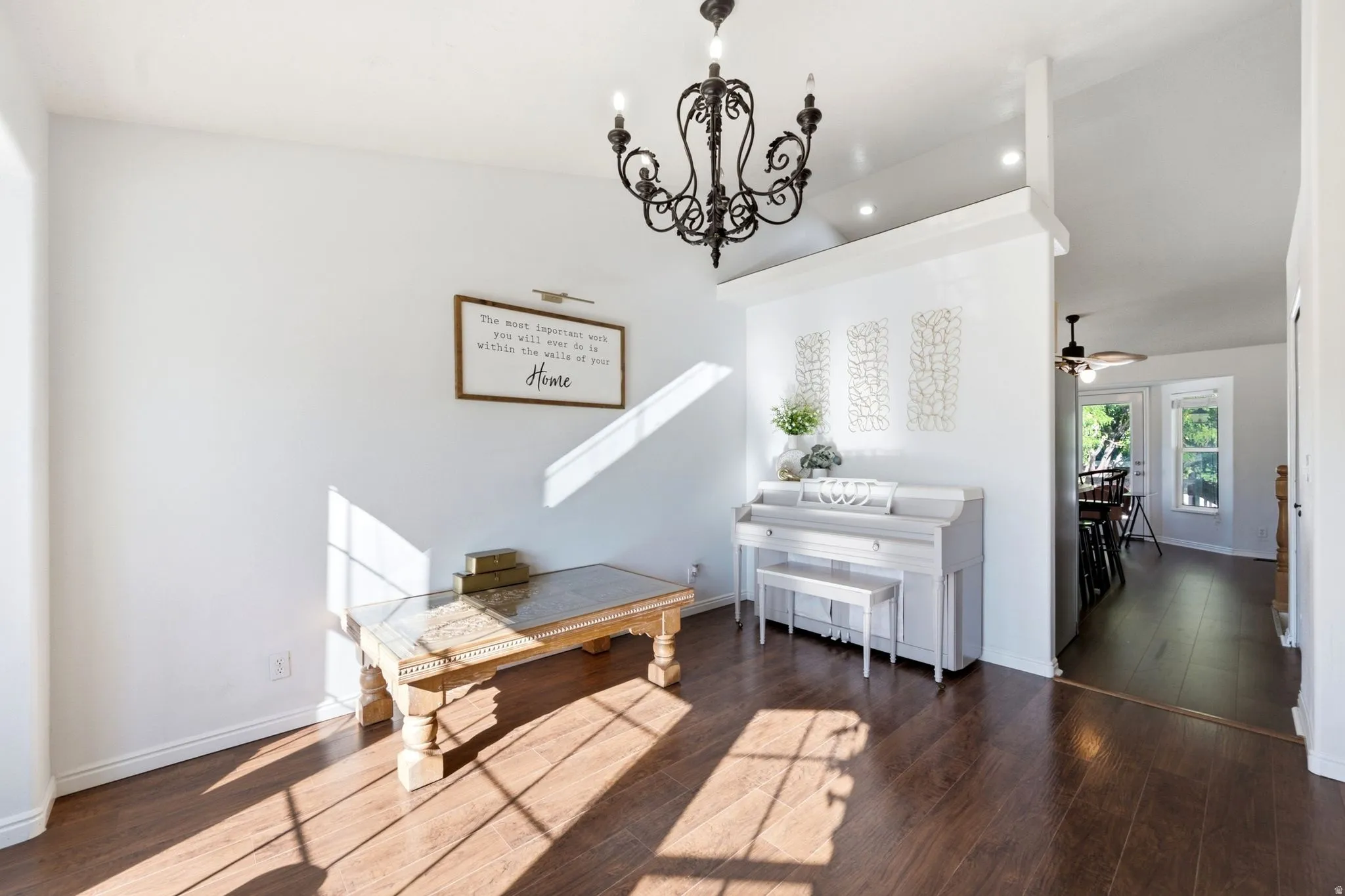 Dark wood-finish flooring complemented by white walls